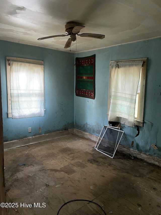 empty room with a ceiling fan