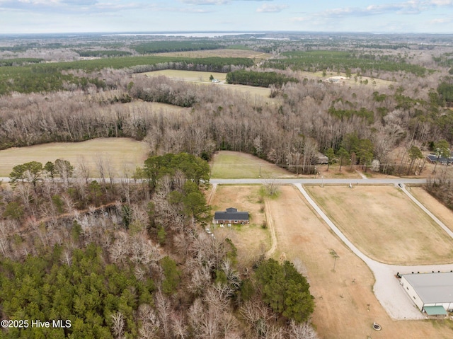 birds eye view of property with a rural view