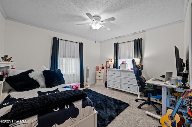 carpeted bedroom featuring a textured ceiling, crown molding, and ceiling fan