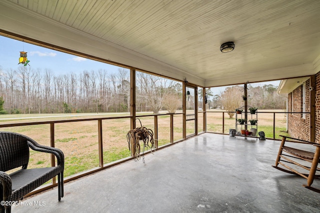 unfurnished sunroom with a healthy amount of sunlight