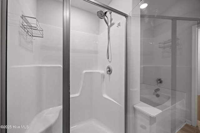 bathroom featuring a shower stall