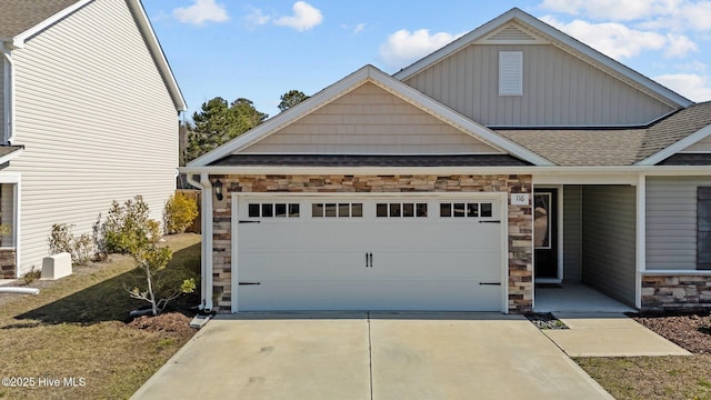 garage featuring driveway