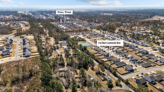 drone / aerial view featuring a residential view