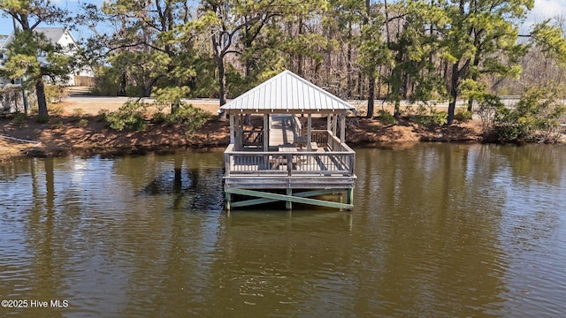 dock area featuring a gazebo and a water view