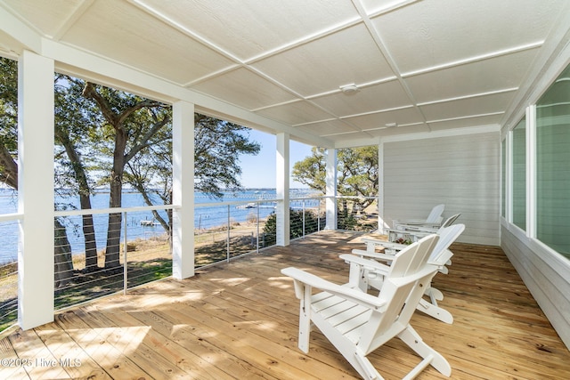 deck featuring a water view