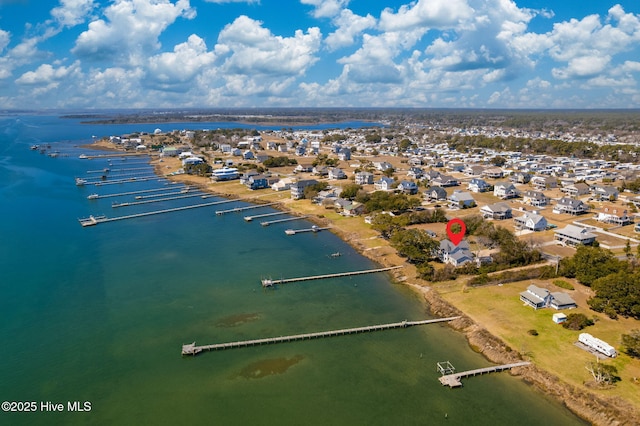 bird's eye view with a water view and a residential view