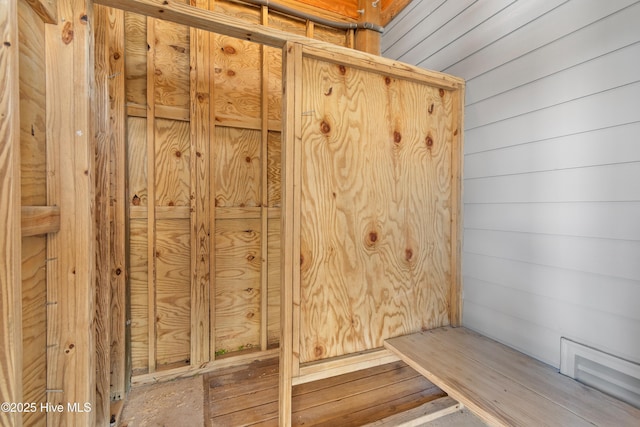 room details featuring wooden walls