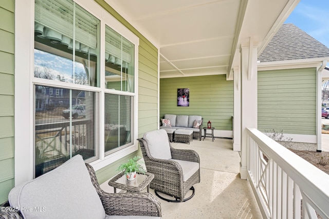 balcony featuring a porch and an outdoor hangout area