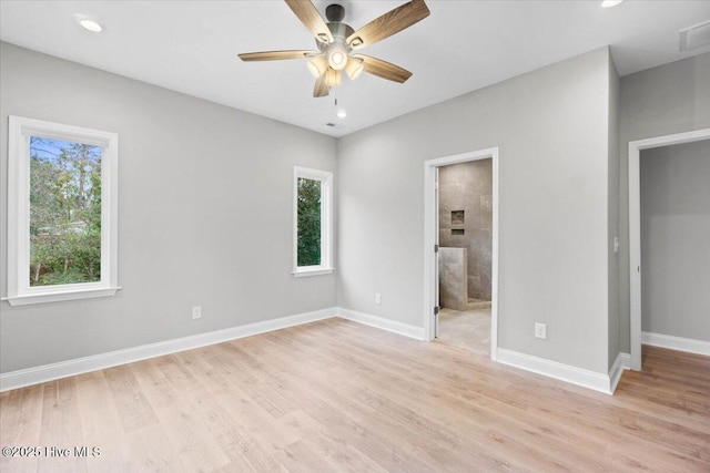 unfurnished bedroom with visible vents, light wood-style flooring, recessed lighting, and baseboards