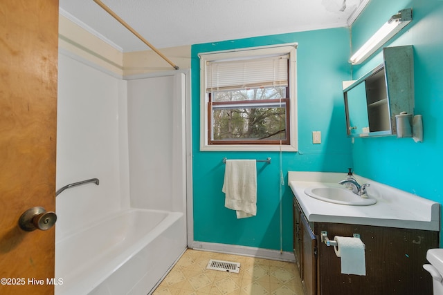 full bath with vanity, baseboards, visible vents, shower / bathing tub combination, and tile patterned floors