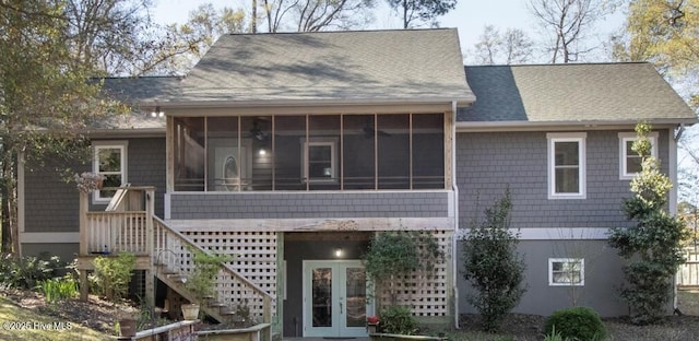8808 Nadie Ln, Wilmington, NC 28411 - rear view of house with a sunroom, french doors, a shingled roof, and stairs