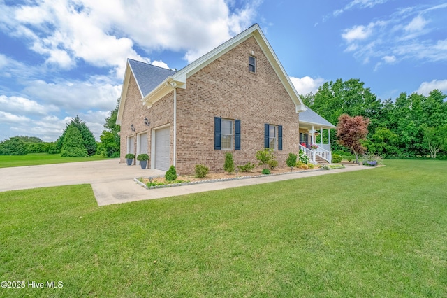 view of side of home featuring a lawn, driveway, a porch, an attached garage, and brick siding