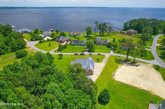 birds eye view of property featuring a water view and a residential view