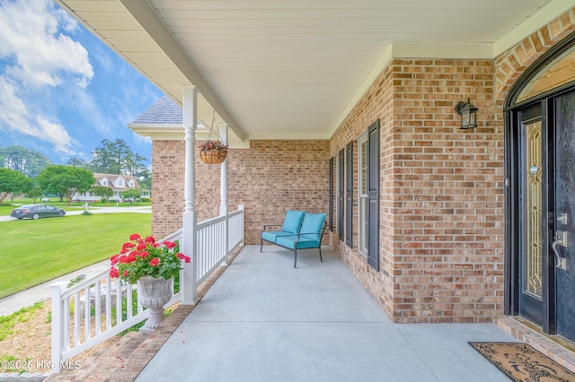 view of patio featuring covered porch