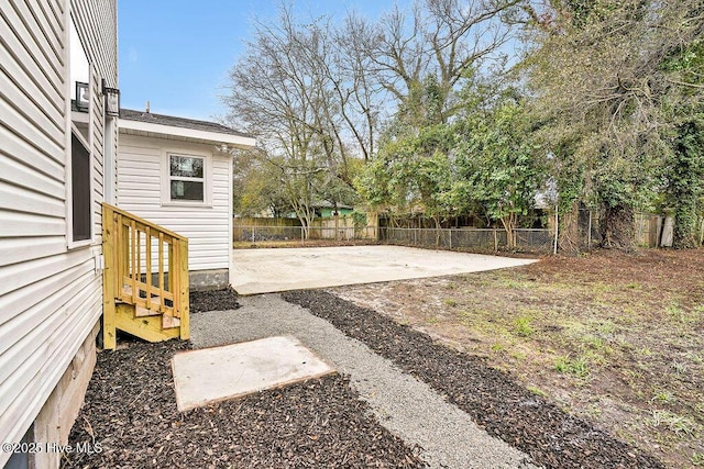 view of yard featuring a patio area and fence