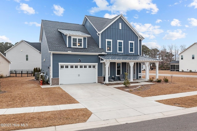 modern farmhouse style home featuring board and batten siding, a porch, brick siding, and a standing seam roof