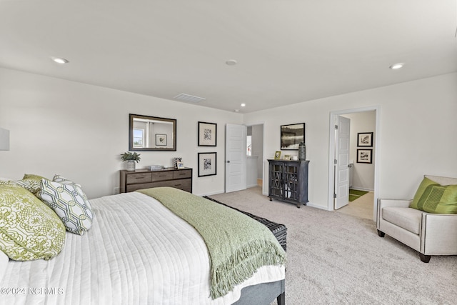 bedroom featuring recessed lighting, visible vents, baseboards, and light colored carpet