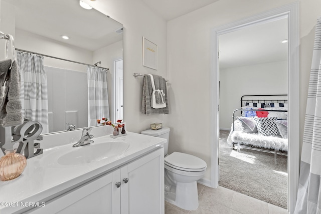 bathroom with tile patterned flooring, connected bathroom, toilet, recessed lighting, and vanity