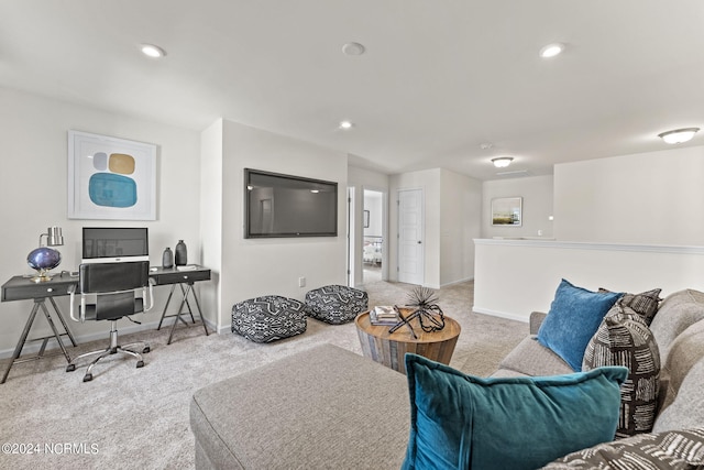 living area with recessed lighting, baseboards, and carpet flooring