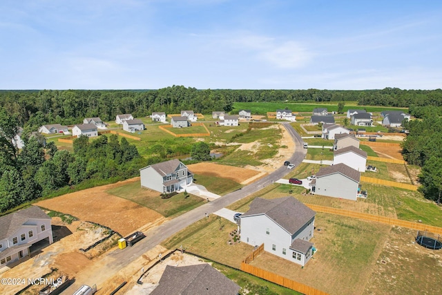 aerial view featuring a view of trees