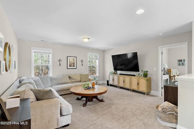 carpeted living room featuring a wealth of natural light, recessed lighting, and baseboards