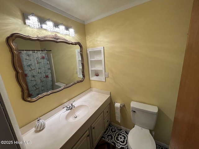 full bath with baseboards, vanity, toilet, and crown molding