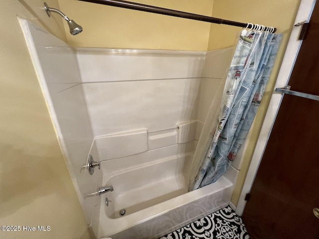 full bath featuring shower / bath combo with shower curtain