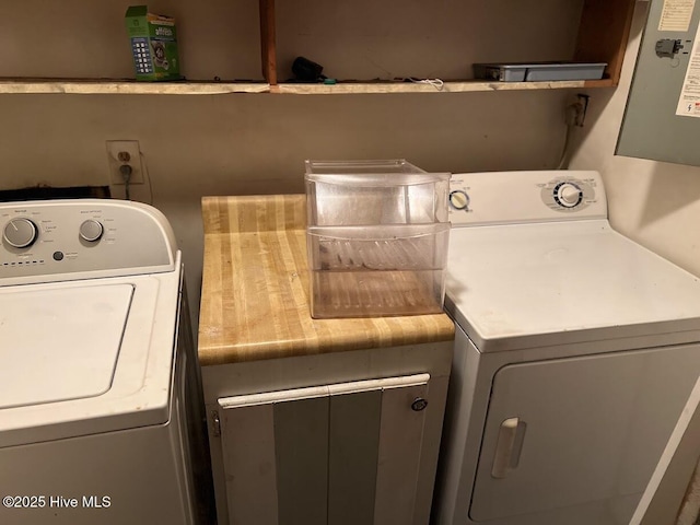 washroom featuring laundry area and washer and clothes dryer