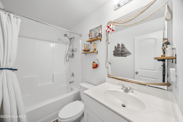 bathroom with toilet, vanity, and shower / bath combo