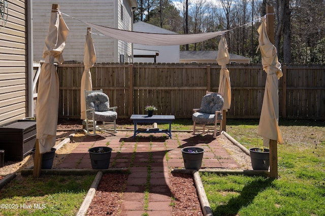 view of patio with fence