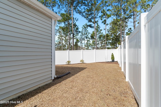 view of yard featuring a fenced backyard