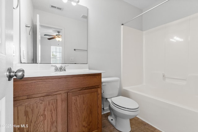 bathroom with vanity, visible vents, tub / shower combination, tile patterned floors, and toilet