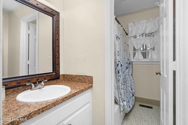 bathroom with vanity, tile patterned floors, and visible vents