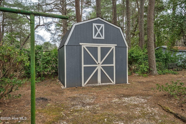 view of barn featuring a storage shed