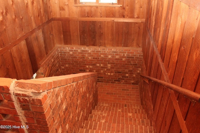 interior space with a sauna and wooden walls