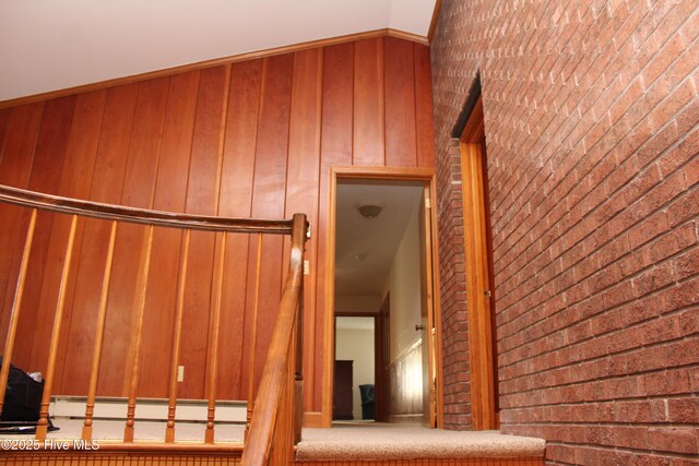 stairway with wooden walls