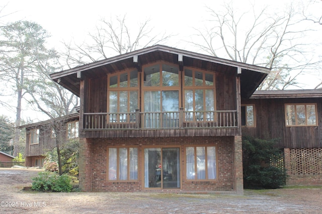 exterior space with brick siding