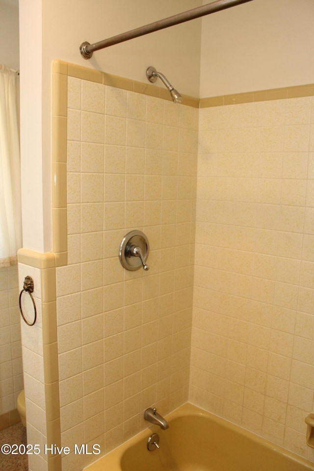 bathroom featuring shower / bath combination