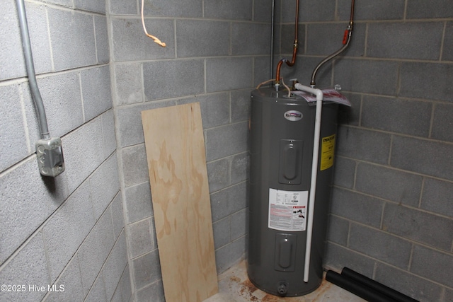 utility room with water heater