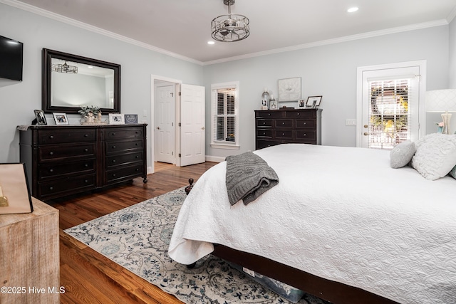 bedroom with dark wood finished floors, crown molding, and recessed lighting