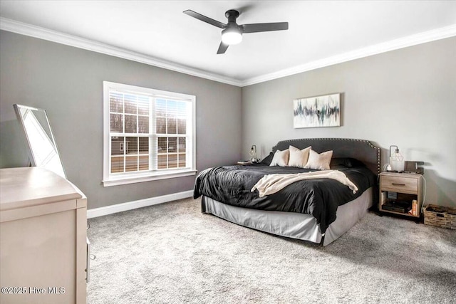 bedroom featuring baseboards, carpet floors, a ceiling fan, and crown molding