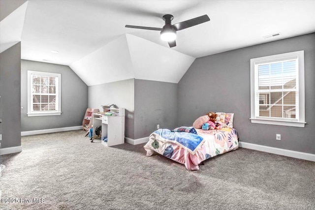 bedroom featuring vaulted ceiling, visible vents, and carpet floors