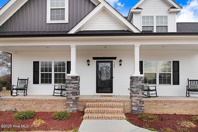 view of front facade featuring a porch and board and batten siding