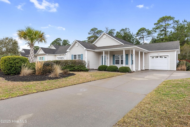 view of front of home with a garage and driveway