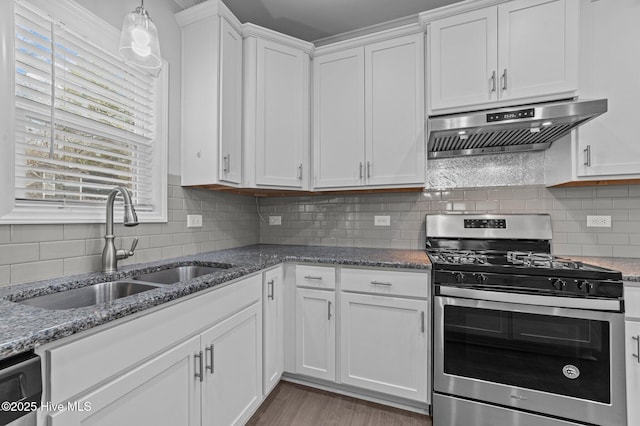 kitchen with dishwashing machine, stainless steel range with gas cooktop, a sink, white cabinets, and under cabinet range hood