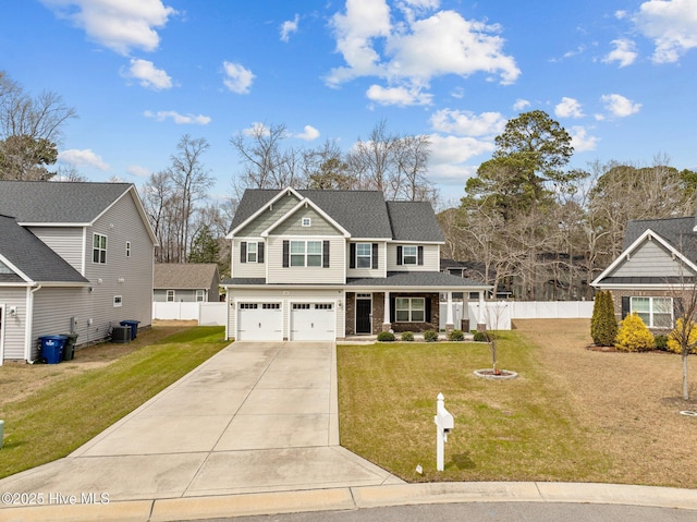 traditional-style house with fence, concrete driveway, central AC, a front yard, and an attached garage