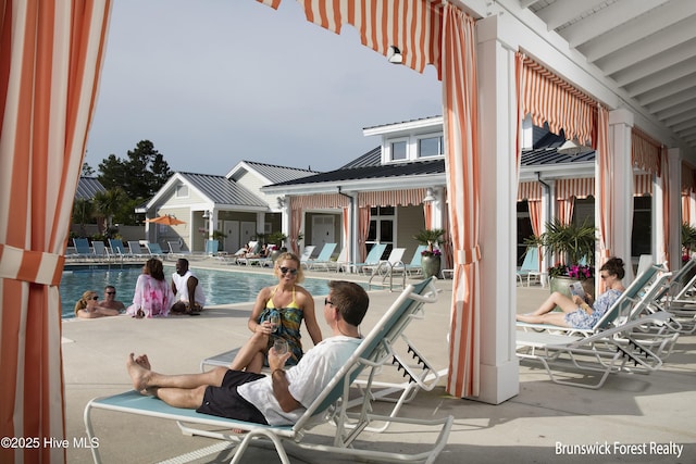 view of patio / terrace with a community pool