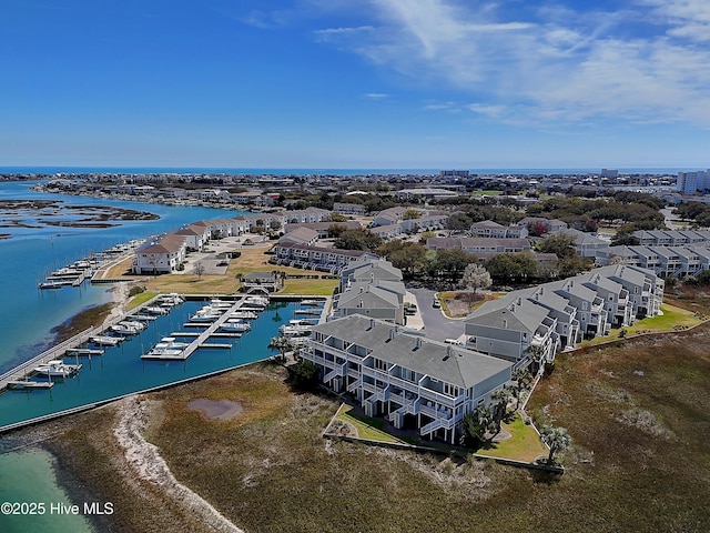 bird's eye view with a water view