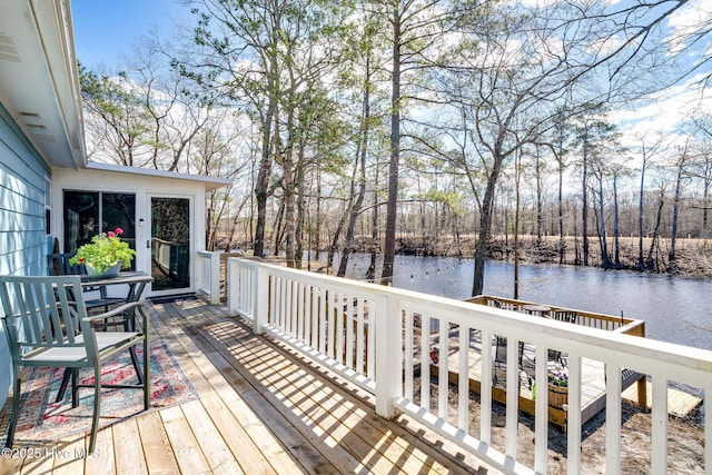 deck featuring a water view