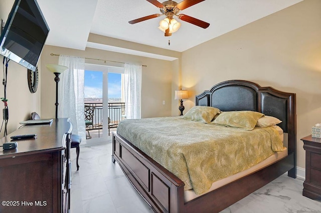 bedroom featuring access to exterior, baseboards, marble finish floor, and ceiling fan